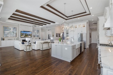 Under contract-accepting backup offers. Exquisite Luxury Home on Fox Hollow Golf Club in Florida - for sale on GolfHomes.com, golf home, golf lot