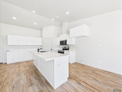 Welcome to this beautifully crafted townhome, ideally situated on Mesa Del Sol Golf Club in Arizona - for sale on GolfHomes.com, golf home, golf lot