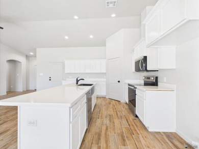 Welcome to this beautifully crafted townhome, ideally situated on Mesa Del Sol Golf Club in Arizona - for sale on GolfHomes.com, golf home, golf lot