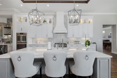 Under contract-accepting backup offers. Exquisite Luxury Home on Fox Hollow Golf Club in Florida - for sale on GolfHomes.com, golf home, golf lot