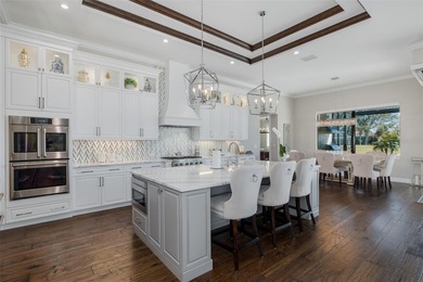 Under contract-accepting backup offers. Exquisite Luxury Home on Fox Hollow Golf Club in Florida - for sale on GolfHomes.com, golf home, golf lot