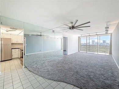 Enjoy unobstructed panoramic views of the Turnberry golf course on Turnberry Isle Resort and Club in Florida - for sale on GolfHomes.com, golf home, golf lot