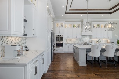 Under contract-accepting backup offers. Exquisite Luxury Home on Fox Hollow Golf Club in Florida - for sale on GolfHomes.com, golf home, golf lot