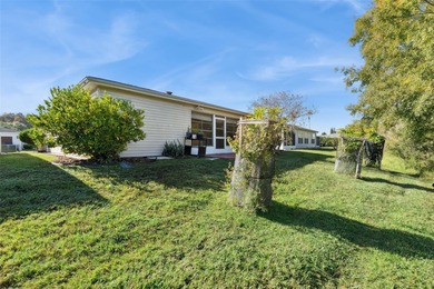 Welcome to this COZY 2 bedroom 2 bath home on a beautiful on Tampa Bay Golf and Country Club in Florida - for sale on GolfHomes.com, golf home, golf lot