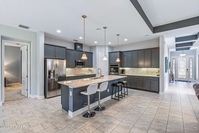 Welcome to 209 Heatherwood Court, perfectly positioned on a on Plantation Bay Golf and Country Club in Florida - for sale on GolfHomes.com, golf home, golf lot