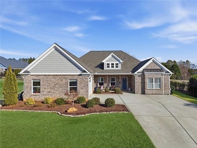 The one you've been waiting for is finally here! Truly the best on Traditions of Braselton Golf Club in Georgia - for sale on GolfHomes.com, golf home, golf lot