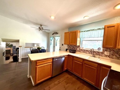 Come see this 4-level home, ideally situated in a desirable GOLF on Desert Hawk At Pueblo West in Colorado - for sale on GolfHomes.com, golf home, golf lot