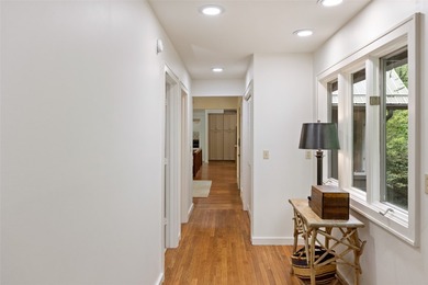 Discover this Holly Forest home in a one-of-a-kind setting on Sapphire National Golf Club in North Carolina - for sale on GolfHomes.com, golf home, golf lot