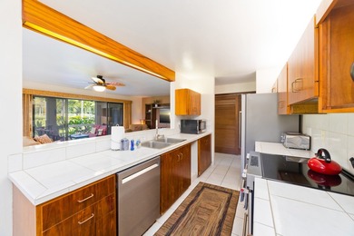 Set within the 17-acre resort grounds of Kanaloa at Kona, Unit on Kona Country Club Golf Course in Hawaii - for sale on GolfHomes.com, golf home, golf lot