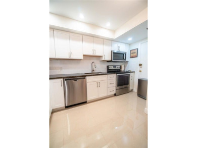 Bright & modern 1 bed/1.5 bath condo on prestigious Diplomat on  in Florida - for sale on GolfHomes.com, golf home, golf lot
