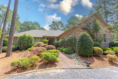 Welcome to this elegant, all-brick custom home built by on Pinewild Country Club of Pinehurst in North Carolina - for sale on GolfHomes.com, golf home, golf lot