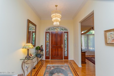 Welcome to this elegant, all-brick custom home built by on Pinewild Country Club of Pinehurst in North Carolina - for sale on GolfHomes.com, golf home, golf lot