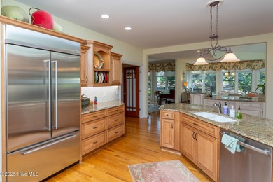 Welcome to this elegant, all-brick custom home built by on Pinewild Country Club of Pinehurst in North Carolina - for sale on GolfHomes.com, golf home, golf lot