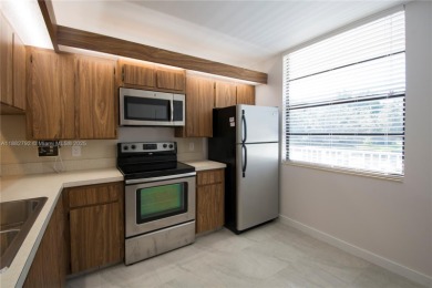 Oversized corner unit with 2 bedrooms & two full baths. Includes on Pine Island Ridge Country Club in Florida - for sale on GolfHomes.com, golf home, golf lot