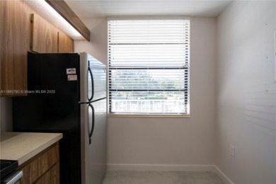 Oversized corner unit with 2 bedrooms & two full baths. Includes on Pine Island Ridge Country Club in Florida - for sale on GolfHomes.com, golf home, golf lot