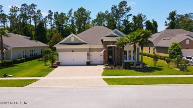 Welcome to your dream home in the highly sought-after Palencia on The Palencia Club in Florida - for sale on GolfHomes.com, golf home, golf lot