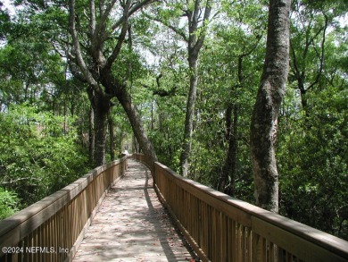 Welcome to your dream home in the highly sought-after Palencia on The Palencia Club in Florida - for sale on GolfHomes.com, golf home, golf lot