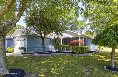 This charming renovated home, nestled on a corner lot and on Greenbriar Woodlands in New Jersey - for sale on GolfHomes.com, golf home, golf lot