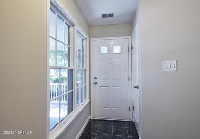 This charming renovated home, nestled on a corner lot and on Greenbriar Woodlands in New Jersey - for sale on GolfHomes.com, golf home, golf lot