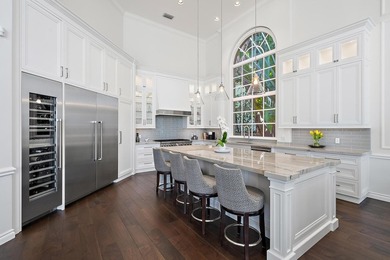 Experience waterfront living at its finest in this rare on Jonathans Landing Golf Club in Florida - for sale on GolfHomes.com, golf home, golf lot