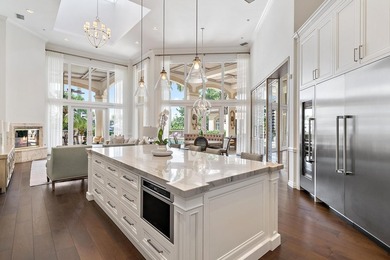 Experience waterfront living at its finest in this rare on Jonathans Landing Golf Club in Florida - for sale on GolfHomes.com, golf home, golf lot