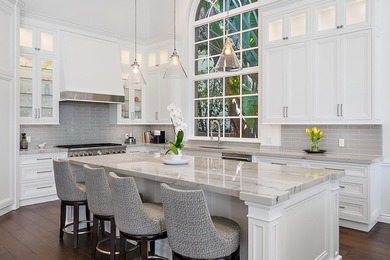 Experience waterfront living at its finest in this rare on Jonathans Landing Golf Club in Florida - for sale on GolfHomes.com, golf home, golf lot