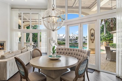 Experience waterfront living at its finest in this rare on Jonathans Landing Golf Club in Florida - for sale on GolfHomes.com, golf home, golf lot