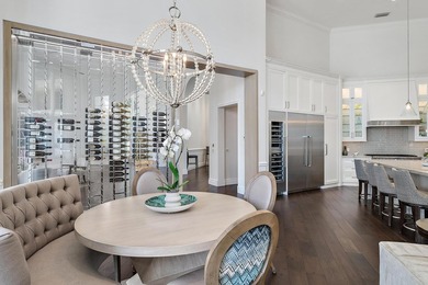 Experience waterfront living at its finest in this rare on Jonathans Landing Golf Club in Florida - for sale on GolfHomes.com, golf home, golf lot