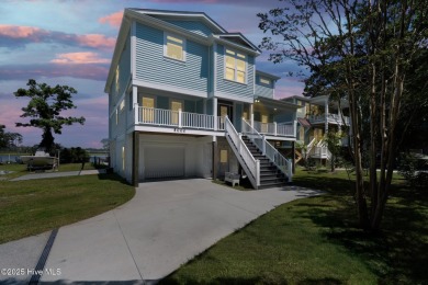 Experience luxury coastal living at its finest on Oak Island's on Founders Club At St. James Plantation in North Carolina - for sale on GolfHomes.com, golf home, golf lot