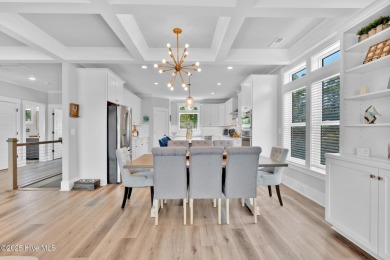 Experience luxury coastal living at its finest on Oak Island's on Founders Club At St. James Plantation in North Carolina - for sale on GolfHomes.com, golf home, golf lot