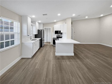 BRAND NEW ROOF - Discover relaxed Florida living in this on Lost Lake Golf Club in Florida - for sale on GolfHomes.com, golf home, golf lot