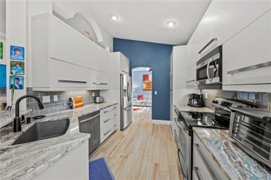 AMAZING VALUE!!  This SIMPLY STUNNING second floor home has been on Bonita Bay West in Florida - for sale on GolfHomes.com, golf home, golf lot