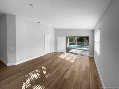 BRAND NEW ROOF - Discover relaxed Florida living in this on Lost Lake Golf Club in Florida - for sale on GolfHomes.com, golf home, golf lot