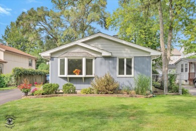 Tucked away on a peaceful, tree-lined street in coveted North on Downers Grove Golf Club in Illinois - for sale on GolfHomes.com, golf home, golf lot
