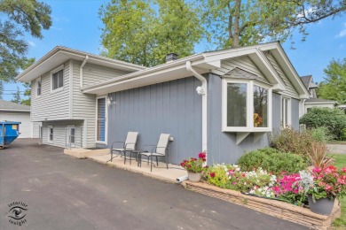 Tucked away on a peaceful, tree-lined street in coveted North on Downers Grove Golf Club in Illinois - for sale on GolfHomes.com, golf home, golf lot