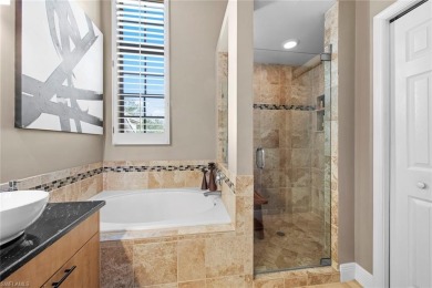 AMAZING VALUE!!  This SIMPLY STUNNING second floor home has been on Bonita Bay West in Florida - for sale on GolfHomes.com, golf home, golf lot
