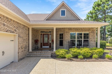 At 3220 Moss Hammock Wynd, craftsmanship and prestige unite in on Members Club At St. James Plantation in North Carolina - for sale on GolfHomes.com, golf home, golf lot