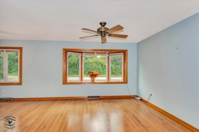 Tucked away on a peaceful, tree-lined street in coveted North on Downers Grove Golf Club in Illinois - for sale on GolfHomes.com, golf home, golf lot