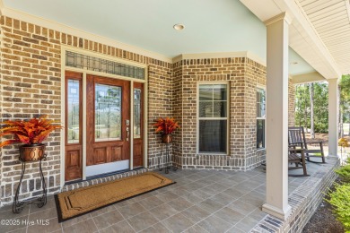 At 3220 Moss Hammock Wynd, craftsmanship and prestige unite in on Members Club At St. James Plantation in North Carolina - for sale on GolfHomes.com, golf home, golf lot