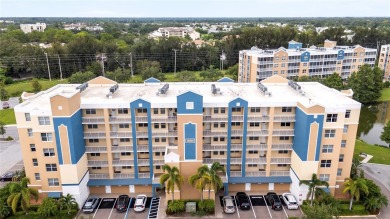 Welcome to this  beautifully maintained 2-bedroom, 2-bath on East Bay Golf Club in Florida - for sale on GolfHomes.com, golf home, golf lot