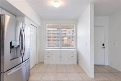 Welcome to this  beautifully maintained 2-bedroom, 2-bath on East Bay Golf Club in Florida - for sale on GolfHomes.com, golf home, golf lot