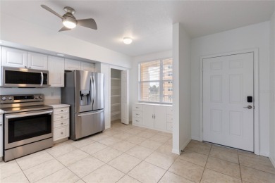 Welcome to this  beautifully maintained 2-bedroom, 2-bath on East Bay Golf Club in Florida - for sale on GolfHomes.com, golf home, golf lot