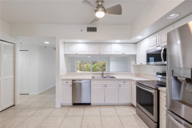 Welcome to this  beautifully maintained 2-bedroom, 2-bath on East Bay Golf Club in Florida - for sale on GolfHomes.com, golf home, golf lot