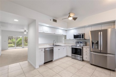 Welcome to this  beautifully maintained 2-bedroom, 2-bath on East Bay Golf Club in Florida - for sale on GolfHomes.com, golf home, golf lot