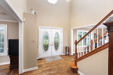 Welcome to this exquisite home nestled down a tree-lined street on White Eagle Golf Club in Illinois - for sale on GolfHomes.com, golf home, golf lot