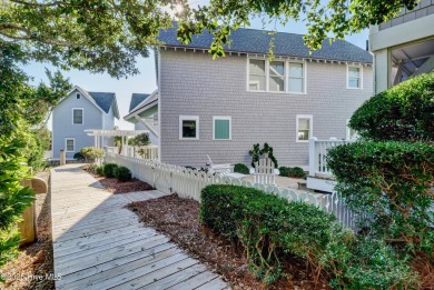 High dunes retreat w/ unmatched ocean vistas tucked atop one of on Bald Head Island Golf Club in North Carolina - for sale on GolfHomes.com, golf home, golf lot
