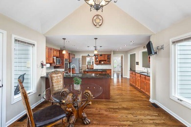 Welcome to this exquisite home nestled down a tree-lined street on White Eagle Golf Club in Illinois - for sale on GolfHomes.com, golf home, golf lot