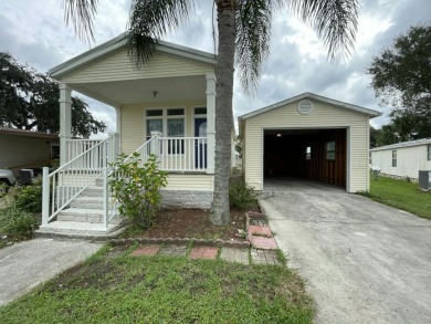 Welcome to your perfect Florida retreat! Nestled in the highly on Golden Lakes Golf Course in Florida - for sale on GolfHomes.com, golf home, golf lot