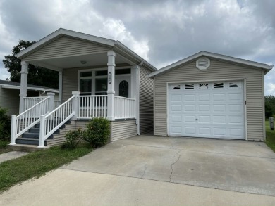 Discover your ideal Florida retreat in this well-maintained 1 on Golden Lakes Golf Course in Florida - for sale on GolfHomes.com, golf home, golf lot