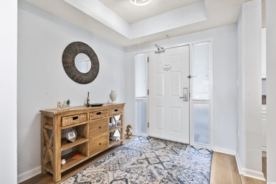 Step into the open-plan living space where light floods in on Barefoot Resort and Golf Club  in South Carolina - for sale on GolfHomes.com, golf home, golf lot